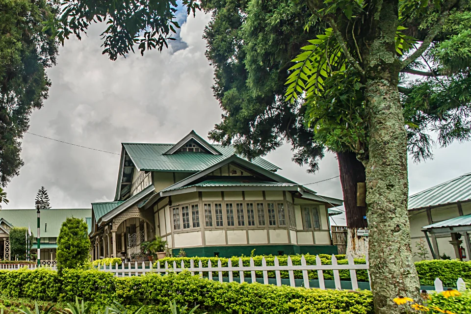 Exterior of a government tourist lodge with scenic views of hills or nature