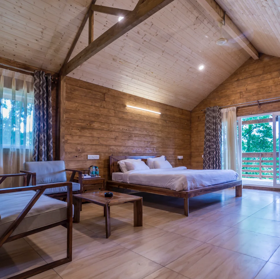 A clean, comfortable room in a Meghalaya government tourist lodge